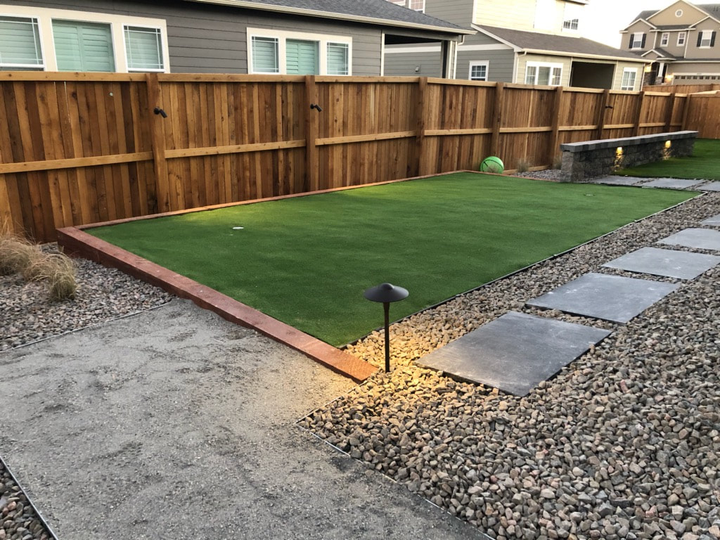 Low voltage outdoor lighting features for a dog friendly, water conserving landscape design in Broomfield, Colorado. 