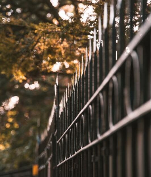 Photo of an elegant wrought iron fence for a Denver home. 