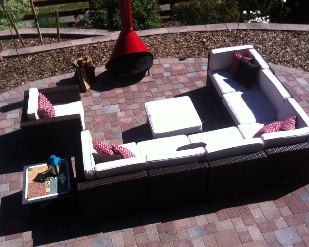 Outdoor fireplace and luxurious lounge chairs in the Denver metro.