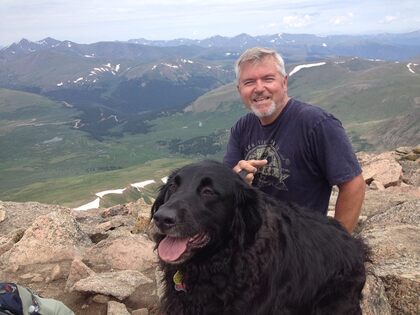 Arterra Landscape Principal, John Majeski with his family pet, Rosie in Colorado.  