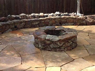 Rustic wood burning fire pit for a stone patio in Arvada, Colorado. 